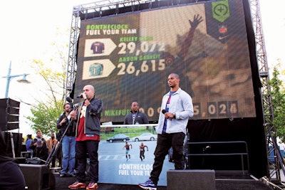 Victor Cruz (right) made an appearance at the “Fast Is Faster Field Day” promotion.