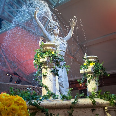 In the cocktail space, a living fountain twirled around slowly. Planners mounted the statue and surrounding water trough over an octagonal hole in Windsor Station's floor, and the set up required reinforced struts covered by flooring and raised three feet above ground level.