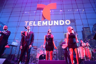 At the after-party in the Allen Room, the Telemundo logo against the glass wall provided a clean backdrop for the house band.