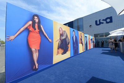 A blue carpet and USA signage pointed guests in the direction of Basketball City.