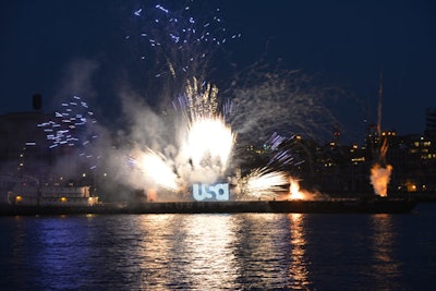 Just after sunset, a barge bearing the USA logo docked in the East River just across from the deck to stage a spectacular fireworks show that had guests oohing and ahhing—and grabbing for their smartphones to snap photos.