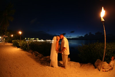 End of Night Kiss on Private Beach at Pierre’s