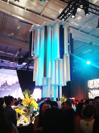 A large wooden sculpture hung over the main bar in the after-party room.