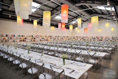 Colorful lamps hung over the chic, minimalist dining space for the Santa Monica Museum of Art's Precognito gala dinner and art preview.