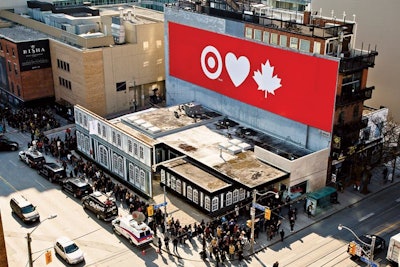 In anticipation of its 2013 launch in Canada, Target hosted a one-day pop-up shop for its Jason Wu collection in Toronto in February 2012. An enormous billboard—a bright red sign combining the bulls-eye logo and colors with that of the Canadian flag—made it hard to miss the retailer's first effort in Canada.