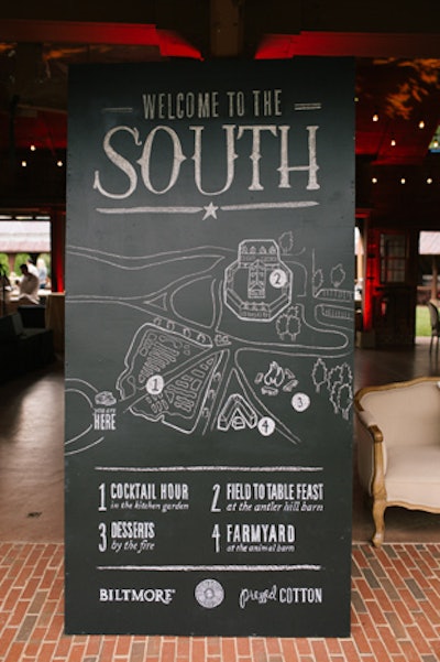 Kicking things off on Sunday was a Southern-hospitality-infused barnyard bash at the estate's historic Antler Hill Barn. A chalkboard map, created by Brent Holloman for Pressed Cotton, outlined the four-part event, which included cocktail hour in the garden, a field-to-table feast in the barn, desserts by the campfire, and a chance to meet the farmyard animals.