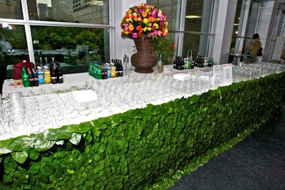 At the leaf-covered bar, servers infused Willa vodka cocktails with botanical elements found at the Garfield Park Conservatory. The specialty drinks, called 'Conservancy Julep' and 'Alliance Elixir,' were served in Mason jars.