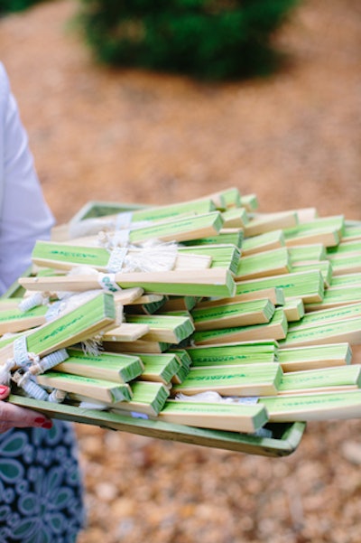 Following one of the morning breaks, organizers passed out custom-printed bamboo fans in case the tents got too warm. Attached was a vial of aromatherapy smelling salts, for a 'breath of fresh air,' as the tag noted.