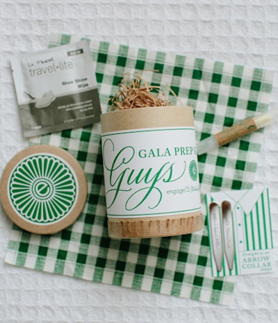 Guests were also invited to pick up a 'Gala Prep' kit to help them get ready for the Gatsby-themed closing party. The women's version included blotting papers and flapper-style bobby pins. The men's kits (pictured) contained collar stays, shoeshine wipes, and mustache wax.