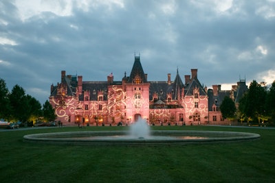 Charleston's Production Design Associates lit up the Biltmore House by projecting the custom-designed gala logo, created by Heather Arak-Kanofsky and Deborah Nadel, onto the façade.