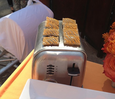 Mini Poptarts with orange-flavored frosting were presented on a vintage toaster.
