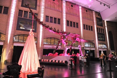A mannequin wearing a giant dress served as a high-impact, fashion-related visual in the main room. Volunteers hid under the skirt, and when guests stuck their hands inside the folds, the volunteers placed bracelets on their wrists. The dress was designed by Toronto's Farley Chatto Designs.