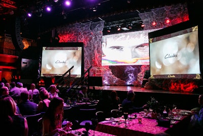 For an onstage award presentation, Frost created a grunge-inspired backdrop made from crumpled-up screens. Colored lights illuminated the arty fixtures.