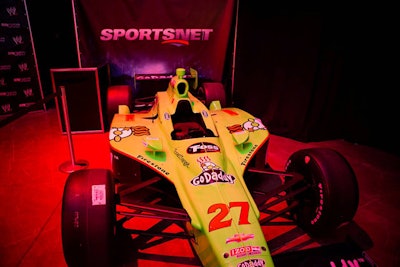 Guests posed for pictures with James Hinchcliffe's Go Daddy Indy car.