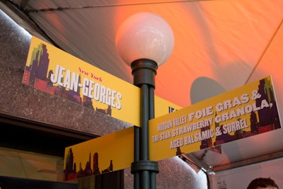 As with years past, signposts styled to look like lampposts helped guests navigate the food and drink stations placed around the rink and inside the restaurant and concourse. The signage, bearing images of either orange groves or a city skyline, also indicated whether the chef hailed from New York or California.