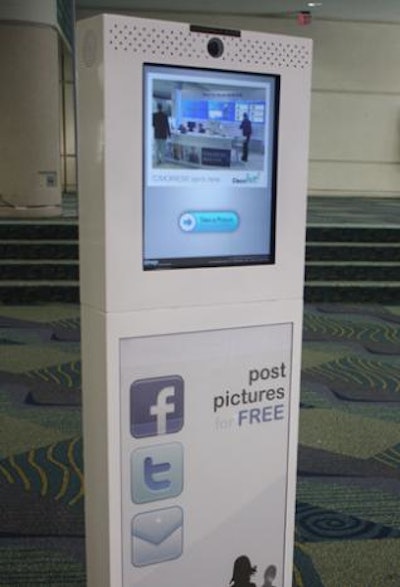 For attendees without a smartphone, Cisco provided a camera mounted in a stationary column with the capability to take pictures and post them to Facebook or Twitter accounts or email to attendees.