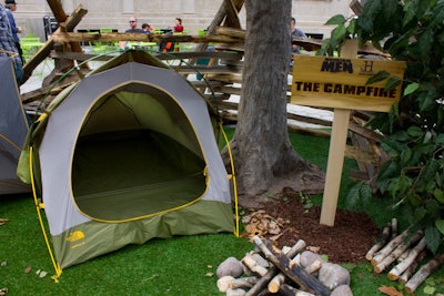 The Campfire area, a spot surrounded by trees and a wood fence, had a tent and bonfire sponsored by North Face.