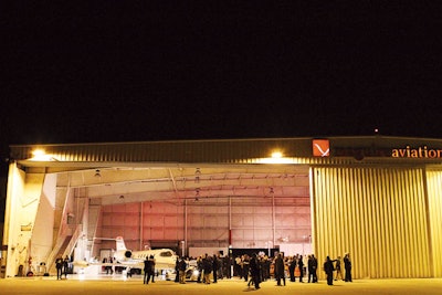 The 'L.A. Suitcase Party' concept invited guests to a party at an airport hangar with instructions to arrive with a packed suitcase and gave them chances to leave on a weekend getaway aboard private jets, helicopters, and luxury cars.