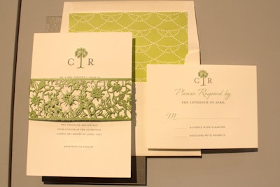 Kleinfeld Paper's preppy Palm Tree Monogram suite includes a laser-cut floral belly band.