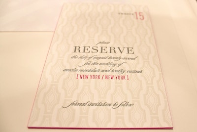 Hand-painted edges can add a subtle pop of color to an otherwise conservative invitation, as seen in the design from Elum.