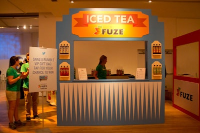 The DJ booth and Fuze's iced tea stand resembled old-school Coney Island carnival booths.