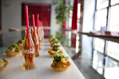 Callahan's inventive creations include fried chicken cups served alongside dollhouse-size Coke bottles.