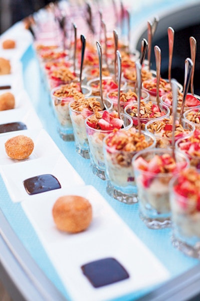 Breakfast bites, including French toast sticks, fruitinis, mini yogurt parfaits, bite-size beignets, and cereal ­shooters, by W San Diego