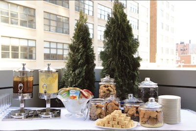Cookie station, including Oreos, pecan sugar cookies, and gingersnaps, as well as ice cream, lemonade, and sweet tea, by the Trump SoHo in New York
