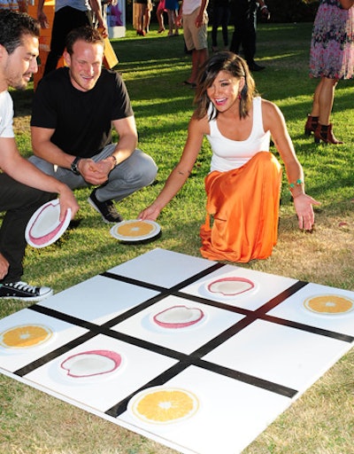 In honor of the fruit-flavored vodkas, a giant board of tic-tac-toe used cutout citrus slices as pieces.