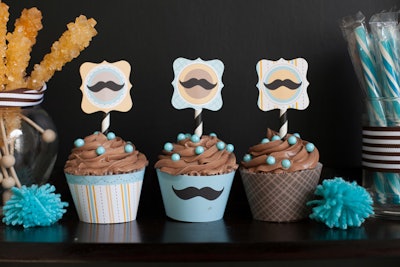 Another of Biggs's baby showers was not so girly. At the event, little mustache flags decked the cupcakes, which were decorated in boy-friendly hues of blue and brown.