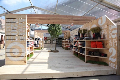 Guests could shop the collection of stationery, apparel, home accessories, and more at a Feed U.S.A. for Target pop-up store housed inside a structure composed of wood pallets.