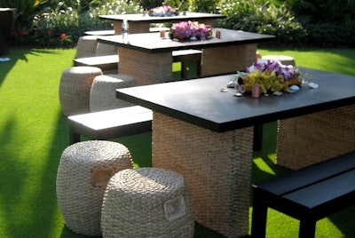 Bubble’s Tribe tables with wicker legs and polished wood tops