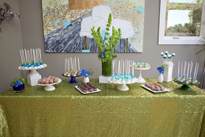 Based in San Francisco, Amy Nichols Special Events recently planned a baby shower with a peacock theme. The dessert table was dressed with glittering chartreuse linens from La Tavola and blue and green floral arrangements from Laurel Designs.
