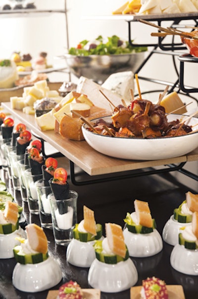 Savory break spread, including Thai chicken satays, sushi and sashimi, smoked mountain trout and crème fraîche on cucumber, edamame, and seaweed salad, and vegetable smoothies, by Lake Lanier Islands Resort in Buford, Georgia