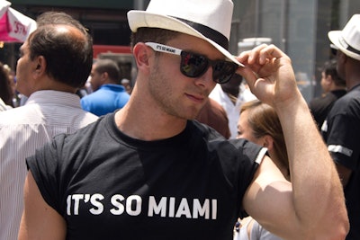 Staff members at the taxi stand gave away free T-shirts, hats, and sunglasses marked with the phrase 'It's So Miami' to anyone who took a ride in the exotic cars.