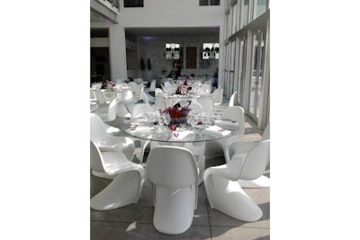 A modern dining room featuring Bubble’s Sally chairs and Bubbly table