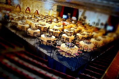 Theater seats disappear under Levitation’s dinner decking within hours.