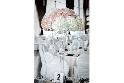 Hydrangea centerpiece on glass with hanging crystals