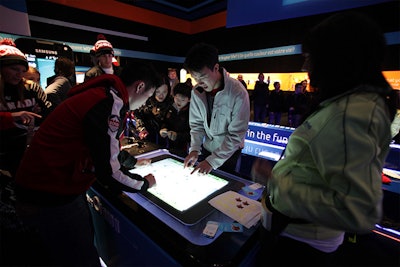 Consumers enjoying Samsung’s Olympic Pavilion