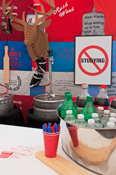 Graduates could enjoy root beer from a keg at the bar, which was custom-made with milk crates and topped with a wood slab that guests could sign with Sharpies.