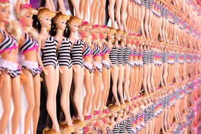 In honor of Barbie’s 50th anniversary, Mattel created a real-life version of the doll’s Malibu Dream House where repeating rows of the iconic toy formed an eye-catching wall.