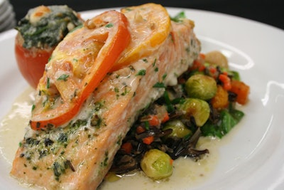 Roasted maple glazed salmon with colorful tomatoes & fine herbs atop a bash of fall vegetables & wild rice petite spinach gratin tomatoes, garlic escarole in a walnut butter