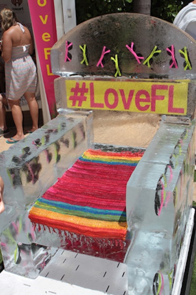 Concert-goers could cool down by sitting in an armchair made of ice. The seat had neon sunglasses as well as Visit Florida's hashtag frozen inside.