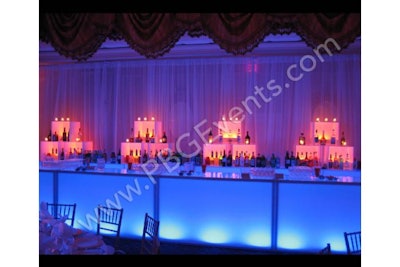 Illuminated white acrylic bar with back bar