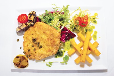 Turkey Milanese with a breadcrumb crust, served with a chopped radicchio, endive, and arugula salad, by Marcey Brownstein Catering & Events in New York