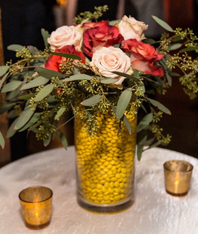 Earlier this year in New Orleans, Jes Gordon designed a Super Bowl party for M&Ms where highboy tables displayed arrangements of roses and eucalyptus nestled in vases filled with the chocolate candies.