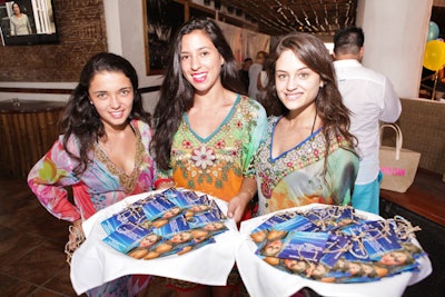 Event staff wore colorful tunics from sponsor Samsara Imports.