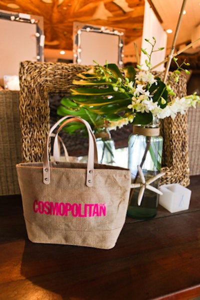 Gift bags were splashed with a bold hot pink logo.