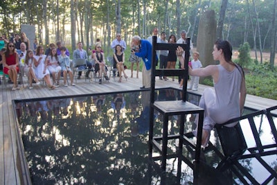 Fashion photographer Bill Cunningham of The New York Times snapped shots of patrons as they ventured from one installation to the next on Watermill’s 8.5-acre campus, a procession that concluded with a performer balancing between two wooden chairs over a shallow pool in Evangelia Rantou's 'Solo With Chairs from Medea(2).'