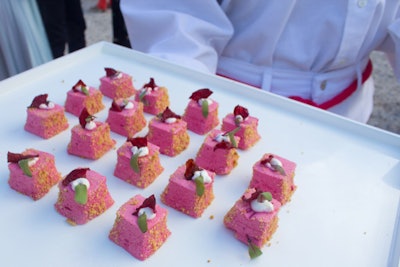 Known as the devil's preferred hue, red featured heavily throughout the space—from watermelon and beet hors d'oeuvres (pictured) to performance costumes to a band of fabric running up the center's front façade for the Hope Esser installation 'Telegraph Process.'